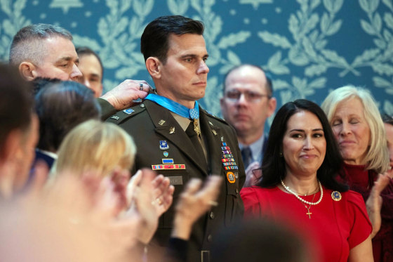 Chief Warrant Officer Eric Slover receives the Congressional Medal of Honor during President Donald Trump's State of the Union address Wednesday