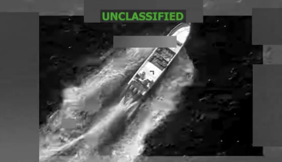 A video still from the X account of U.S Southern Command shows a vessel in the eastern Pacific before it was struck Monday.