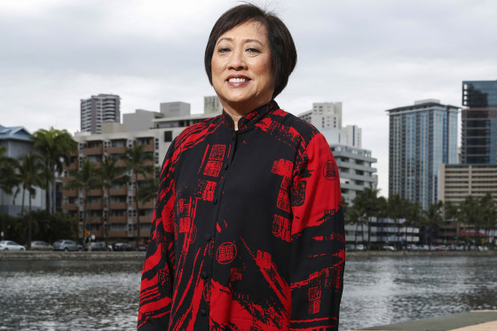 Colleen Hanabusa poses for a photo near the Ala Wai Canal in Honolulu. 