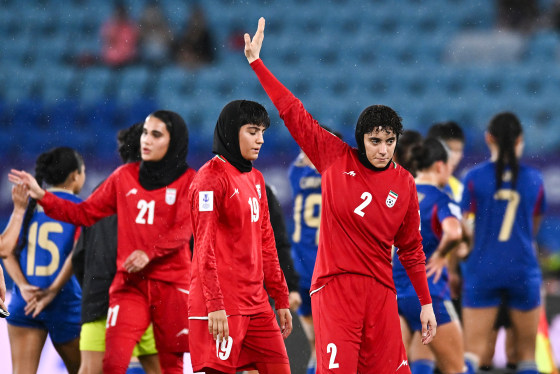 Atefeh Imani waves on the soccer field