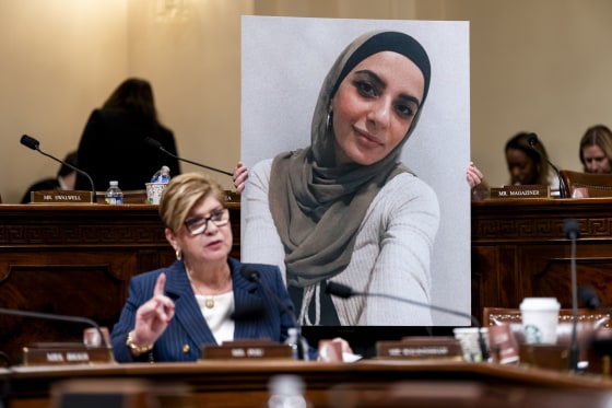 Rep. Nellie Pou, D-N.J., speaks as an aide holds a photo of Leqaa Kordia during a House Homeland Security Committee hearing on Feb. 10, 2026. 
