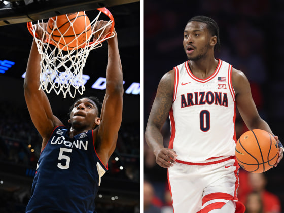 Tarris Reed Jr., left, the UConn Huskies' leading scorer, and Jaden Bradley of the Arizona Wildcats. 