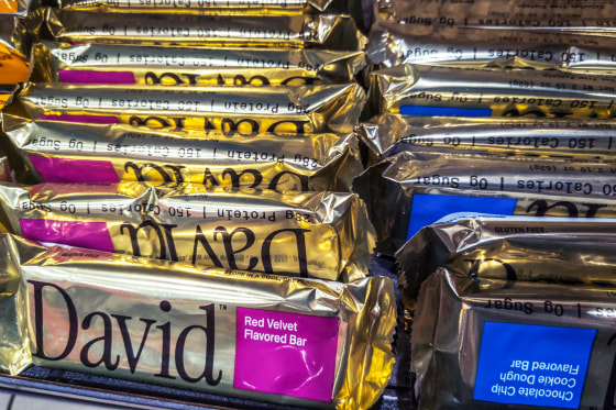 David brand protein bars stacked on a store shelf