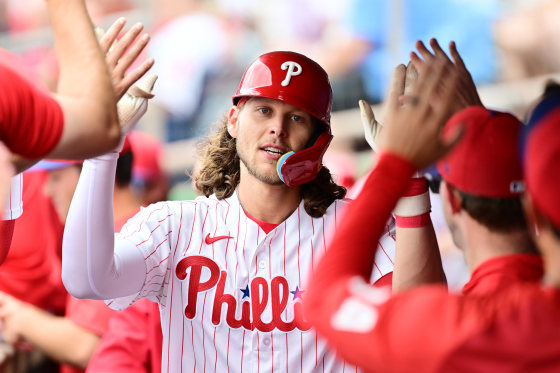 Alec Bohmof the Philadelphia Phillies celebrates in the dugout after having hit a home run against the Toronto Blue Jays in a spring training game in Clearwater, Fla. 