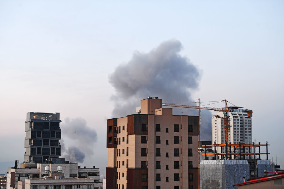 Smoke billows after explosions heard in downtown Tehran, Iran, April 1, 2026. 