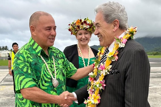 Cook Islands Prime Minister Mark Brown greets New Zealand's Foreign Affairs Minister Winston Peters as he arrives in Rarotonga.