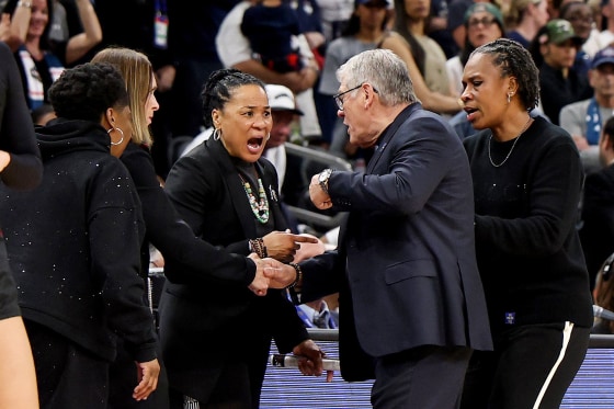 Dawn Staley of the South Carolina Gamecocks and head coach Geno Auriemma of the UConn Huskies.