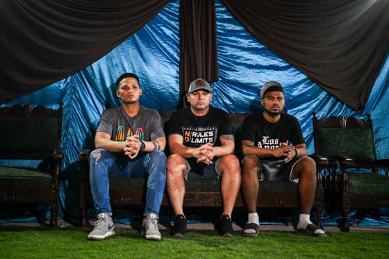 Mervin Yamarte, Ringo Rincon and Edwuar Hernandez, and Andy Perozo (not pictured), Venezuelan migrants repatriated from a prison in El Salvador, attend a Christian evangelicals service in Venezuela, on July 23, 2025.