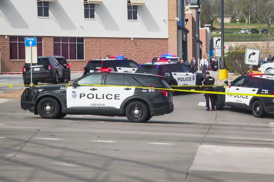 Police cars parked outside of a Walmart