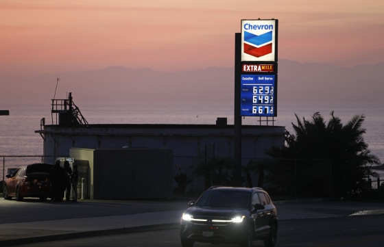 Gas prices are displayed at a station on April 8, 2026 in El Segundo, Calif.