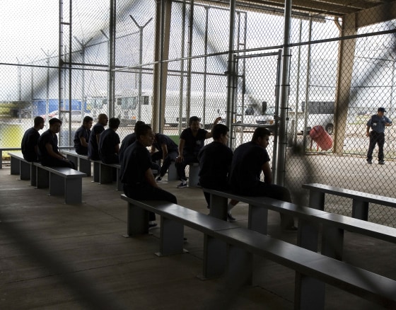 Image: Detainees inside an immigration detention facility.
