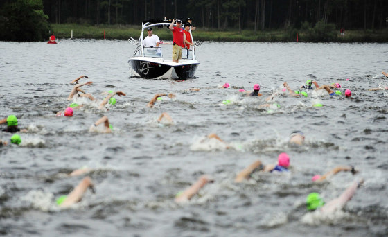 Swimmers compete in the Ironman Texas triathlon