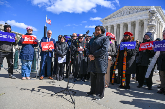 Image: Guerline Jozef, co-founder and Executive Director of Haitian Bridge Alliance, speaks in front of the US Supreme Court in Washington, D.C.