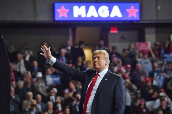 President Donald Trump waves during a rally in Topeka, Kan., on Oct. 6, 2018.