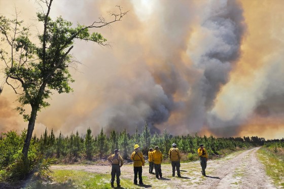 Firefighters respond to the Pineland Road Fire in southeast Georgia on Wednesday, April 22, 2026.