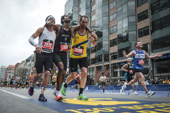 Boston Marathon Helping Runners