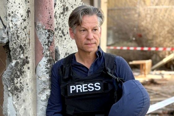 Correspondent Richard Engel in a press flack jacket and helmet.