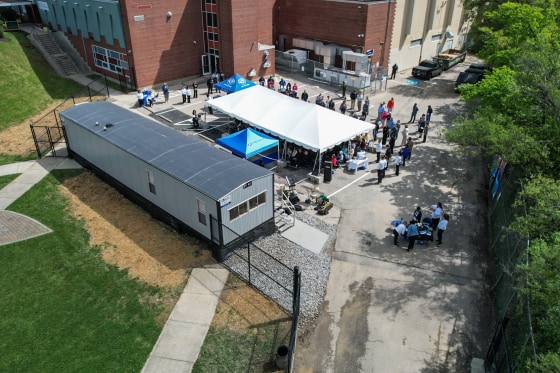 A drone view of the Safe Sleep Lot opening ceremony April 30.