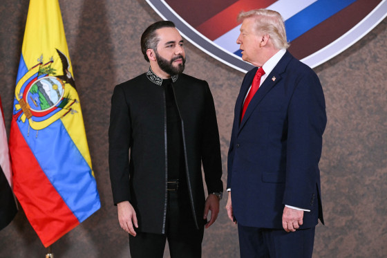 Nayib Bukele, left, and Donald Trump stand next to each other