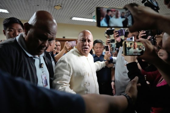 Philippine Senator Ronald dela Rosa speaks to reporters at the Philippine Senate in Pasay on May 12, 2026.
