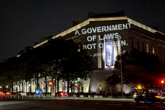 A quotation from John Adams was projected on the side of "Main Justice" on Tuesday night.