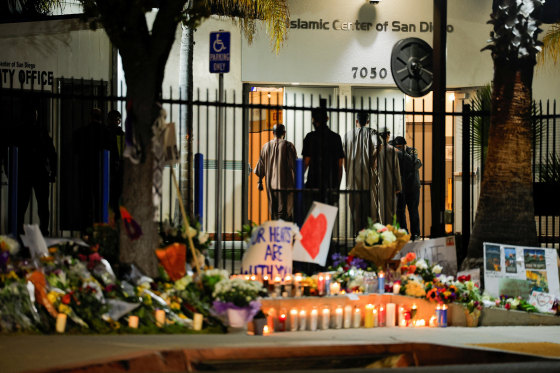 People take part in an early morning call to prayer at the Islamic Center of San Diego