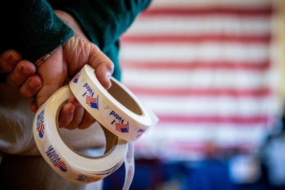 A person carries stickers.