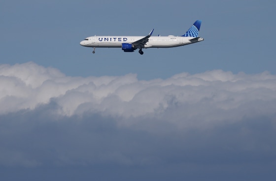 A United Airlines plane in flight.