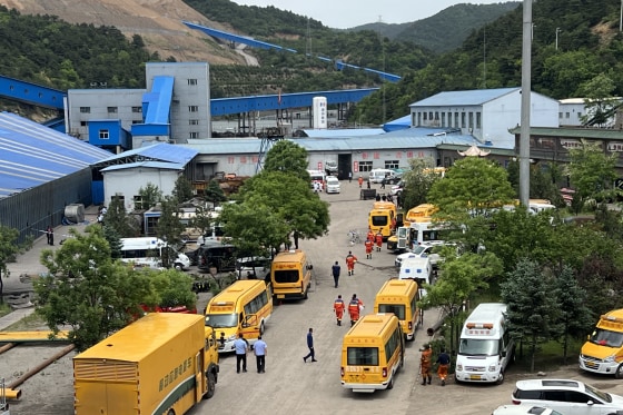 Rescuers carry out search and rescue operations at the site of the Liushenyu coal mine on May 23.