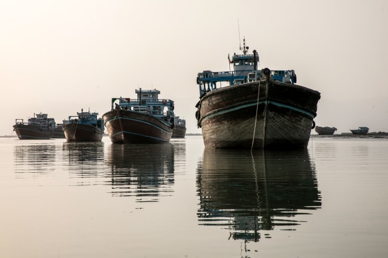 Boats sit on the water