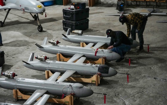 Servicemen of Ukraine's defense intelligence set up the Peklo missile drones inside of a room