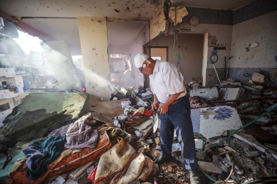 A Palestinian man inspects the site of an Israeli military operation in an apartment in Gaza City, on June 4, 2026. 