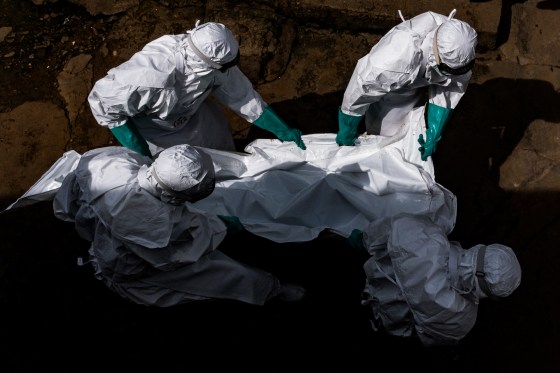 Workers from the Uganda Red Cross Society evacuate the body of a suspected Ebola victim in Kampala on May 26, 2026.