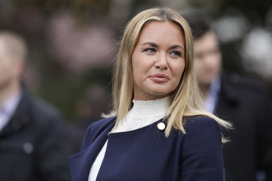 Vanessa Trump looking over her left shoulder against a blurred background.