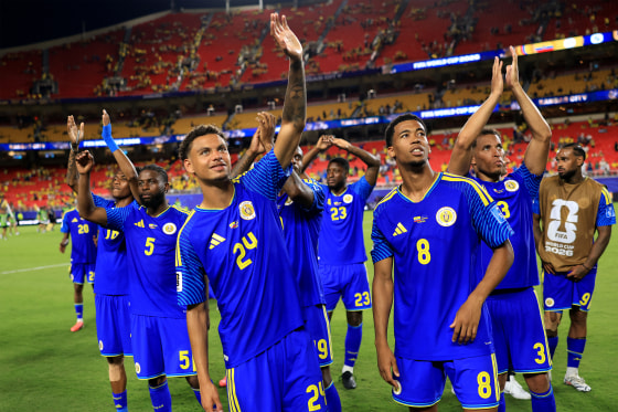 Deveron Fonville #24 and Livano Comenencia #8 of Curacao applaud fans after the 0-0 draw during the FIFA World Cup 2026 Group E match between Ecuador and Curacao at Kansas City Stadium on June 20, 2026 in Kansas City, Missouri.