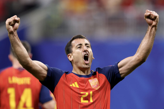 Mikel Oyarzabal pumps both fists in the air in celebration.