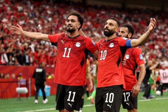 Mohamed Salah, No. 10 of Egypt, celebrates with Mostafa Zico, No. 11, after scoring the team's second goal during the FIFA World Cup 2026 Group G match between New Zealand and Egypt at BC Place Vancouver on June 21, 2026 in Vancouver, British Columbia.