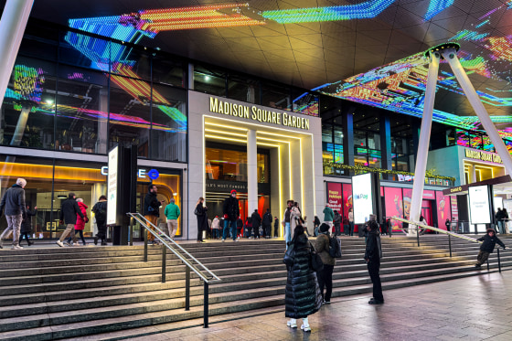 Crowd outside Madison Square Garden entrance at night, Seventh Avenue, Manhattan, New York City, New York, USA