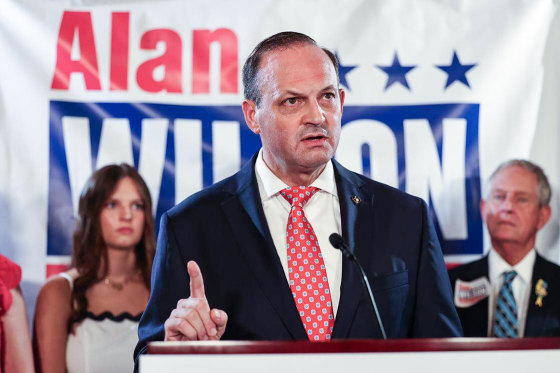 Alan Wilson speaks at a podium