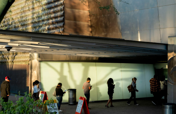 Voters wait in line at a polling location for the 2024 Presidential election.