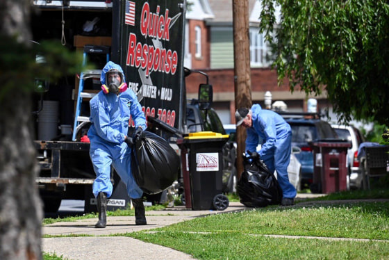 Clean-up crew with plastic bags.