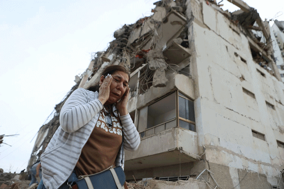 A rotating carousel of six images showing various scenes of destruction in Venezuela in the aftermath of an earthquake