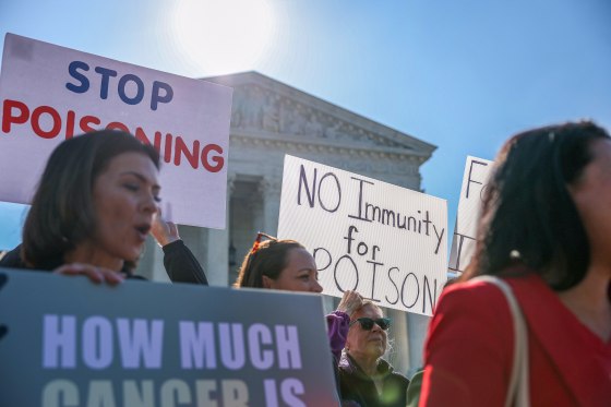 People protest outside the Supreme Court.
