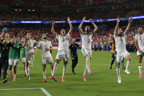 Algeria's Rafik Belghali, Aissa Mandi, Rayan Ait-Nouri, Fares Chaibi, Nabil Bentaleb, Houssem Aouar and Riyad Mahrez celebrate after the 2026 World Cup Group J match between Algeria and Austria ended in a draw Saturday in Kansas City, Mo.