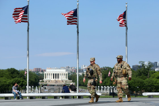 National Guard patrol at the base of the Washington Monument.