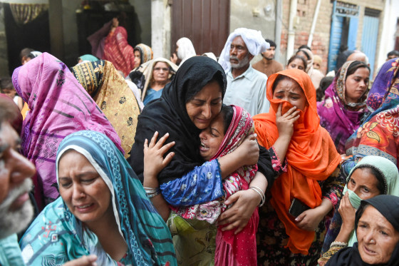 Relatives mourn.