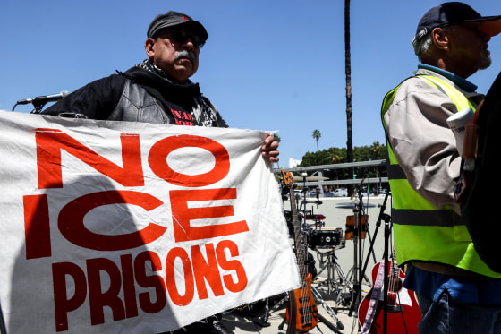 People at a National Day Laborer Organizing Network rally and press conference
