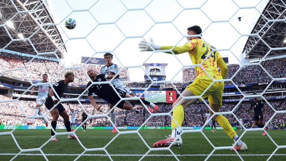 Image carousel of photos from the USA vs. Belgium FIFA World Cup match