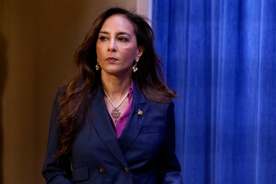 Harmeet Dhillon arrives for a news conference at the Justice Department.