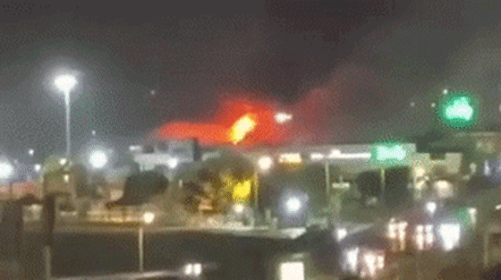 Image: A moving image gif showing explosions and fire near Shahid Haqani Port in Bandar Abbas, Iran
